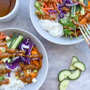 Spring roll bowl with spice cashew sauce on the side