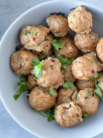 whole30 chicken meatballs in a white bowl