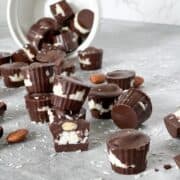 Healthy Almond Joys spilled over with some bites taken out of them.